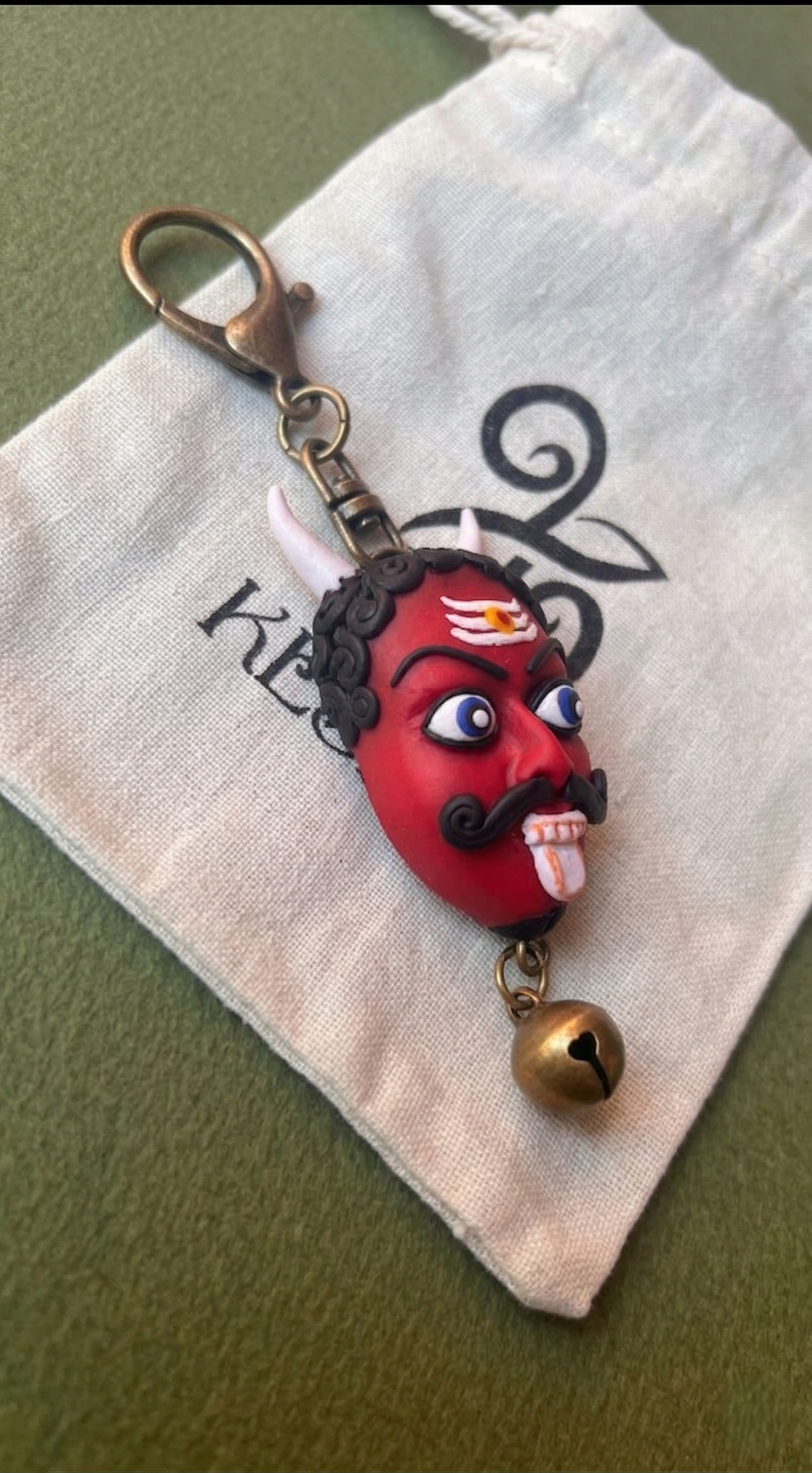 Kollikannu - (Red) Charm